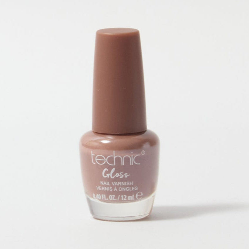 A bottle of gloss nail varnish in the shade Cafe Creme on a white background. It is a chocolate brown colour.