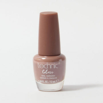 A bottle of gloss nail varnish in the shade Cafe Creme on a white background. It is a chocolate brown colour.