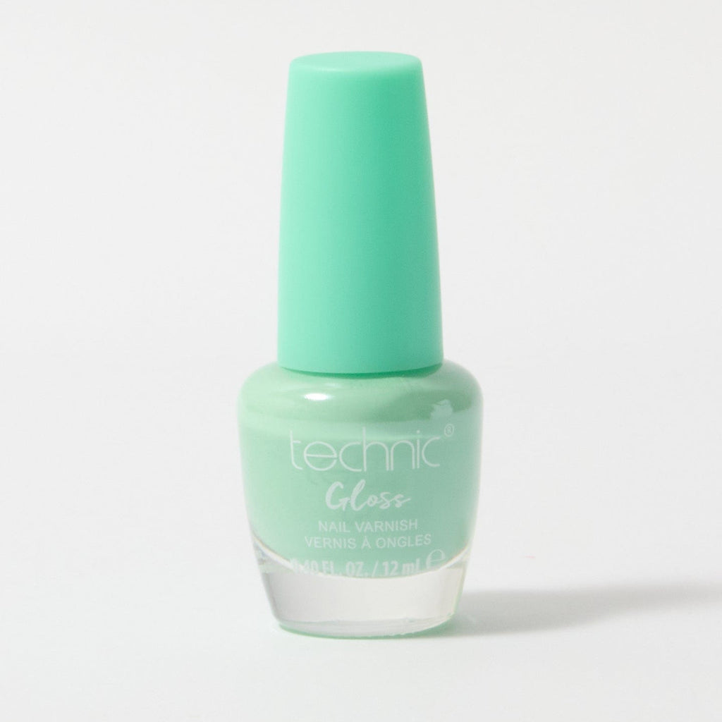 A bottle of gloss nail varnish in the shade Vibes on a white background. It is a bright turquoise colour