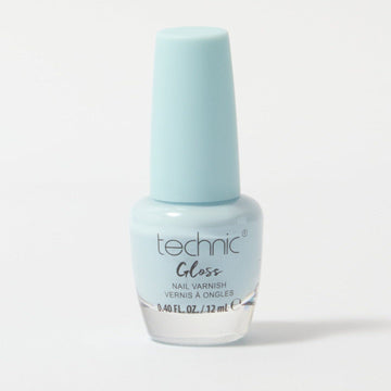 A bottle of gloss nail varnish in the shade Baby Blue on a white background. It is a pastel light blue colour