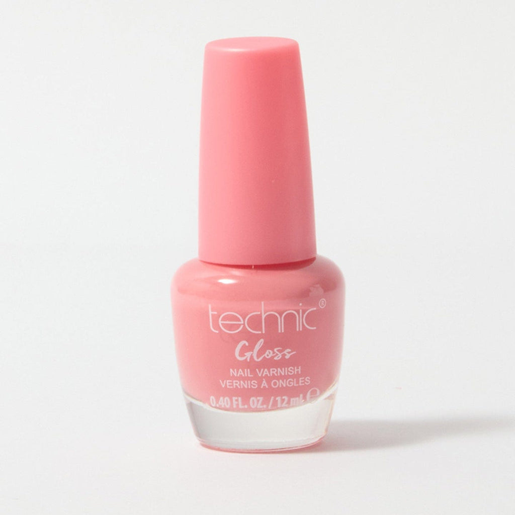 A bottle of gloss nail varnish in the shade Pink Pearl on a white background