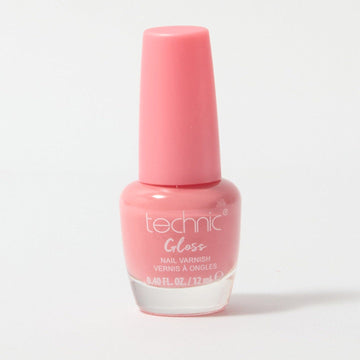 A bottle of gloss nail varnish in the shade Pink Pearl on a white background