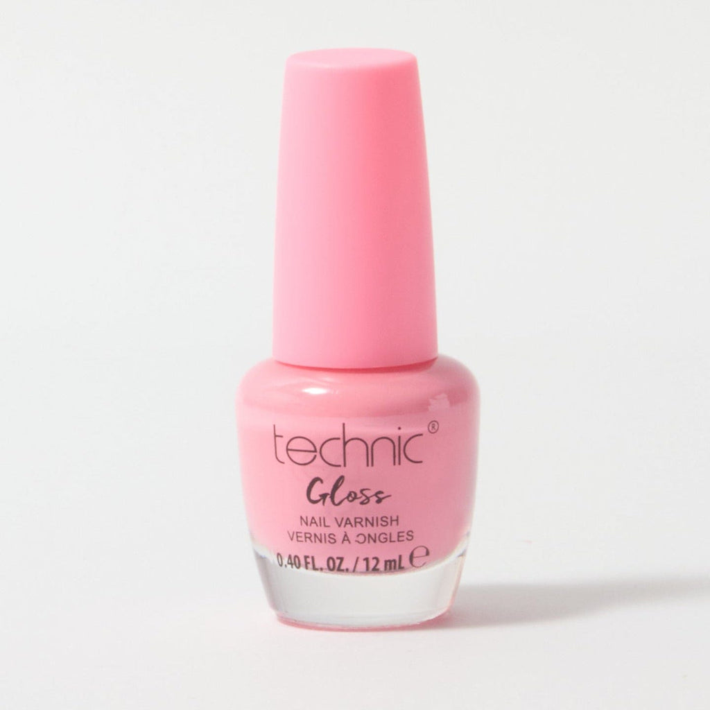 A bottle of gloss nail varnish in the shade Ultra Pink on a white background