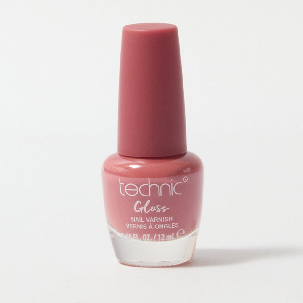 A bottle of gloss nail varnish in the shade Turkish Rose on a white background