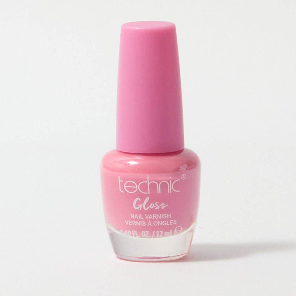A bottle of gloss nail varnish in the shade Raspberry Glaze on a white background