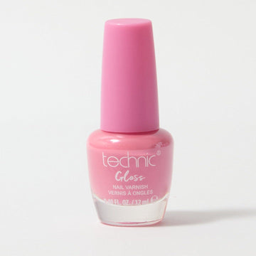 A bottle of gloss nail varnish in the shade Raspberry Glaze on a white background