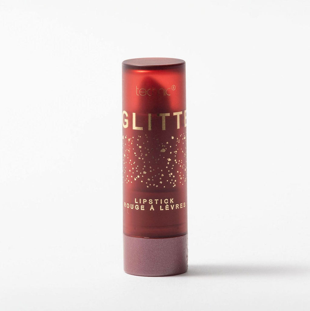 Red glitter lipstick tube with 'technic' branding on a white background