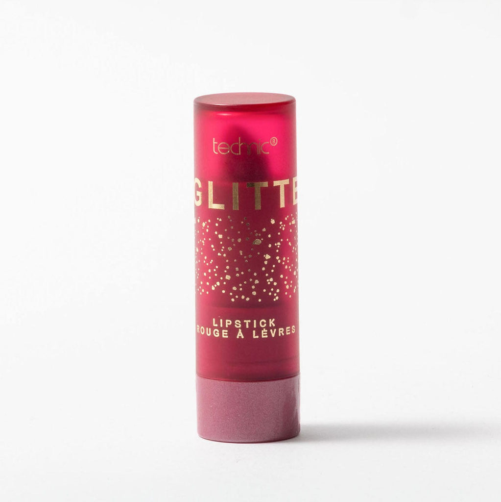 Red glitter lipstick tube with 'technic' branding on a white background