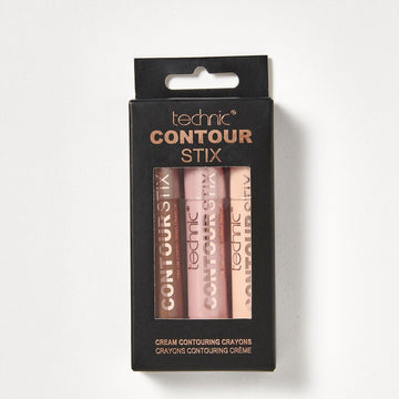 The contour sticks in their original black packaging on a white background. 