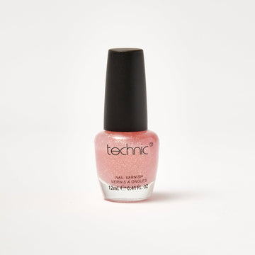 A nail varnish bottle in the shade Festival Fever in front of a white background.