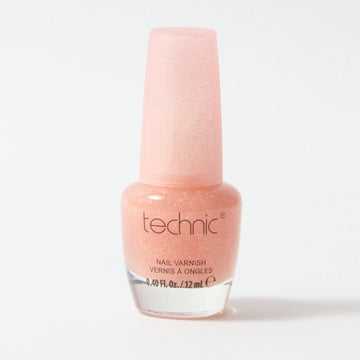 A bottle of shimmer nail varnish in the shade Festival Fever on a white background