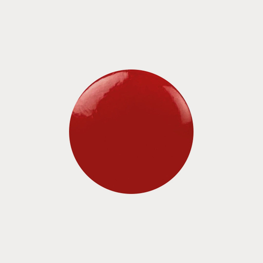 A swatch of the shade Aphrodite. It is a red colour.