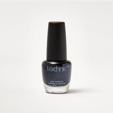 A nail varnish bottle in the shade Black Velvet in front of a white background.