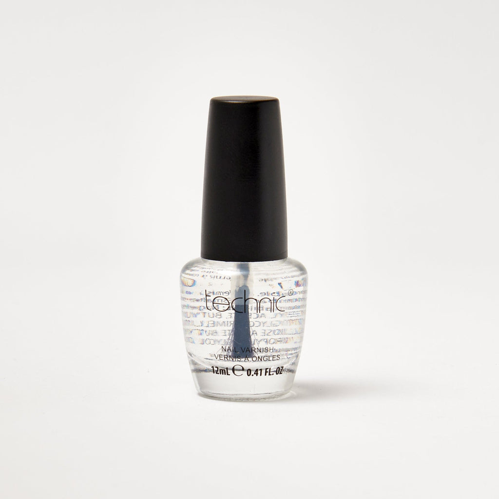 A nail varnish bottle in the shade Clear in front of a white background.