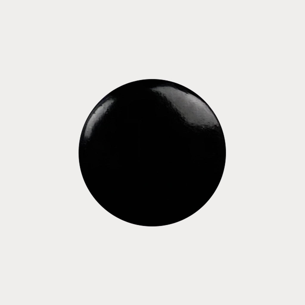 A swatch of the shade Jet Black.