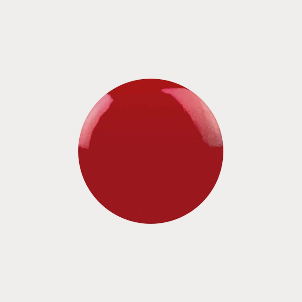 A swatch of the shade Tango Red. It is a hot red colour.