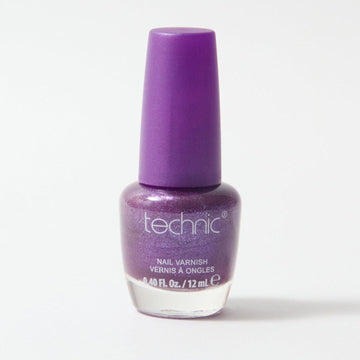 A bottle of shimmer nail varnish in the shade Purple Rain on a white background