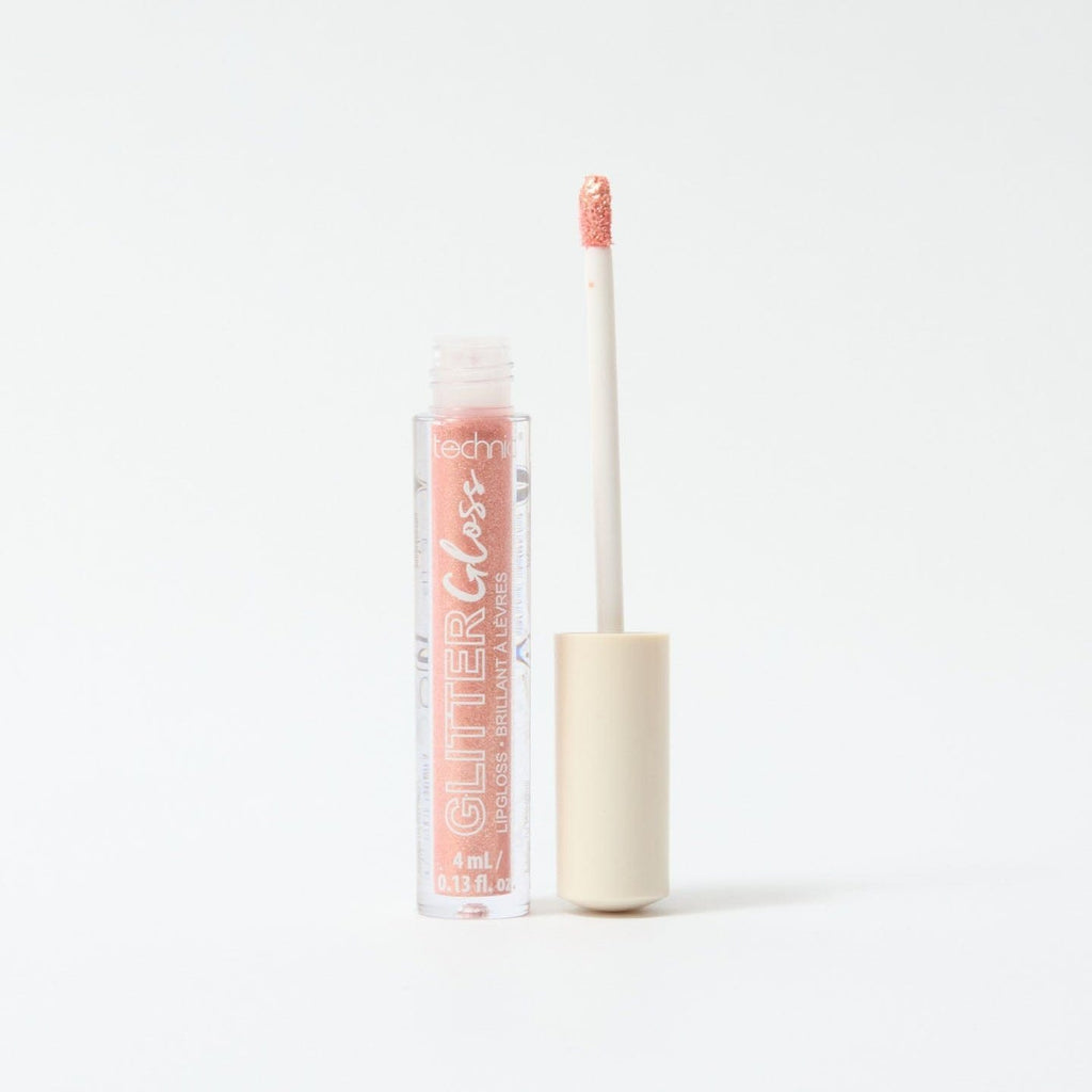 An opened glitter gloss in the shade Rose Gold on a white background.