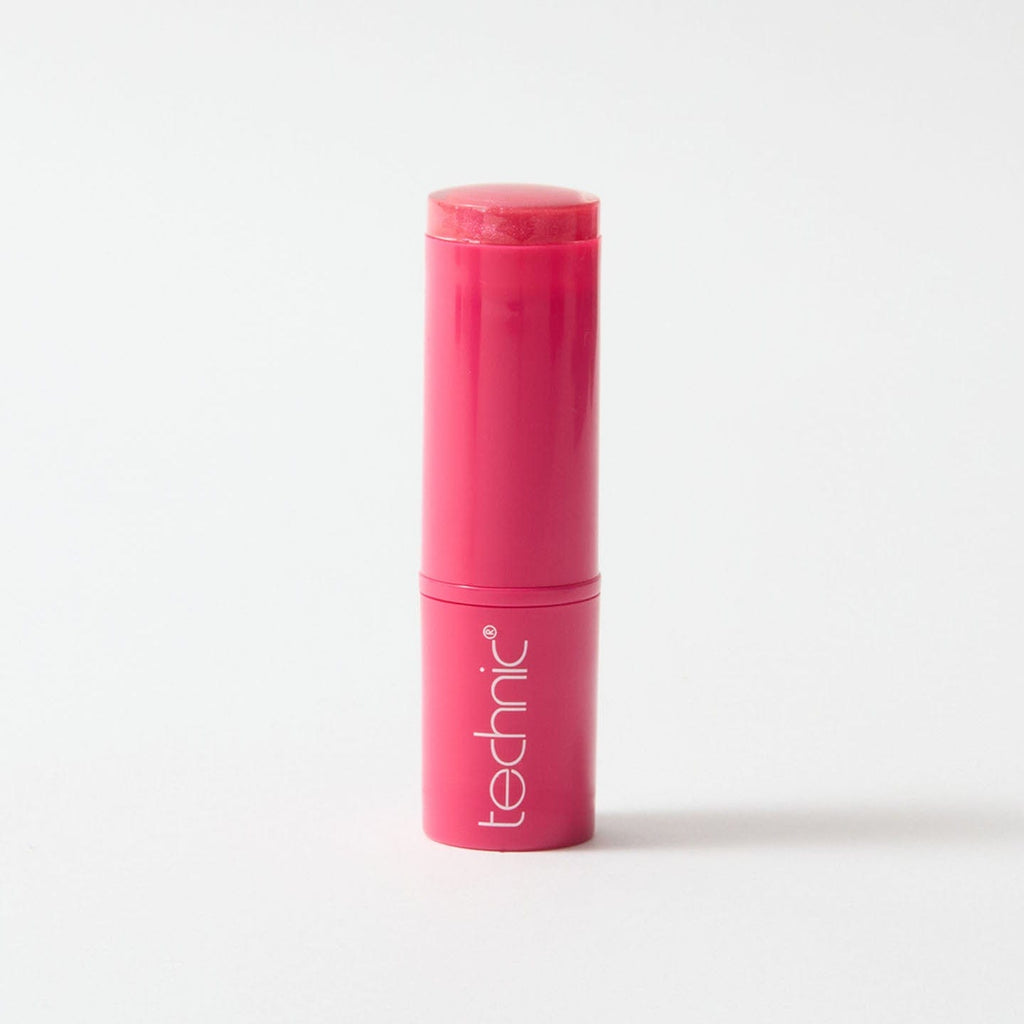 Lipstick in the shade Hot Pink on a white background.