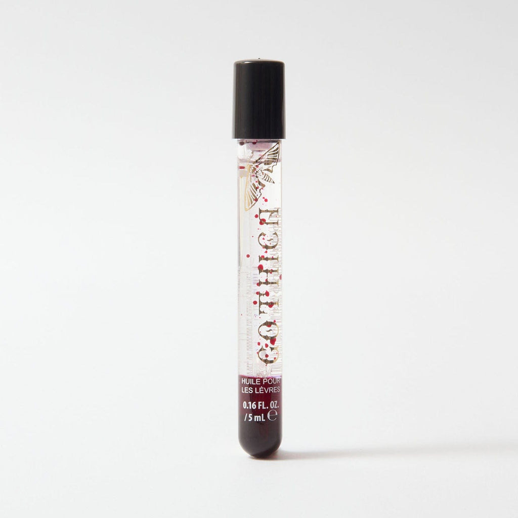 Gothica bloodmoon lip oil on a white background.