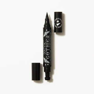 Gothica double ended eyeliner opened on both sides, on a white background.