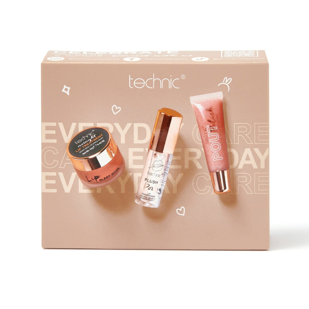 The lip care giftset on a white background. The giftset box is beige with images of the products on the front.