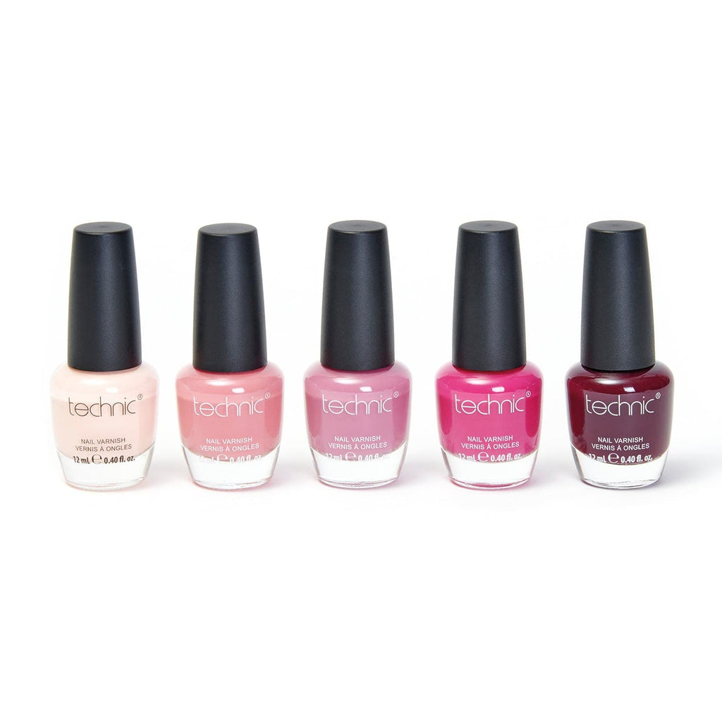 The 5 nail varnishes out of the giftset packaging on a white background.