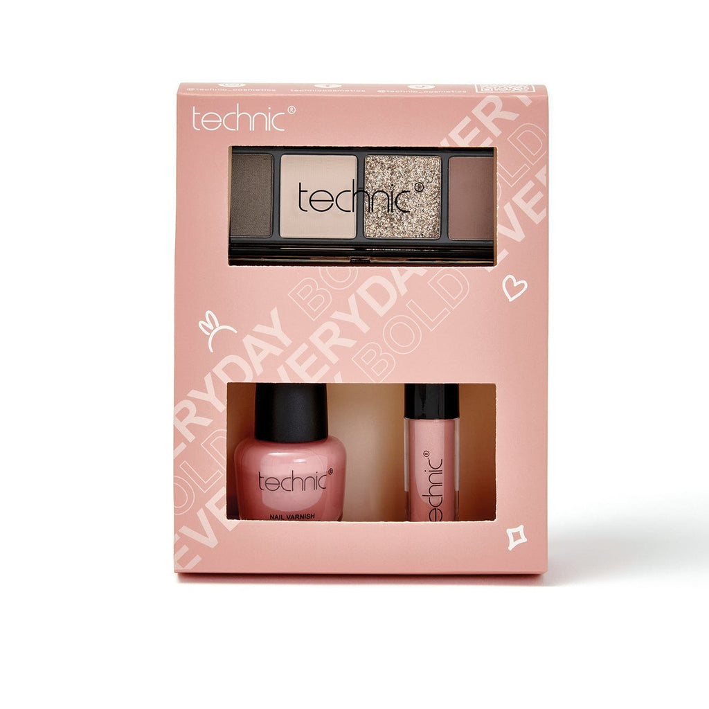 The eyes, lips and nails gift set is in a pink box and has a cut out in the front so the products are shown through the box. It is photographed on a white  background. 