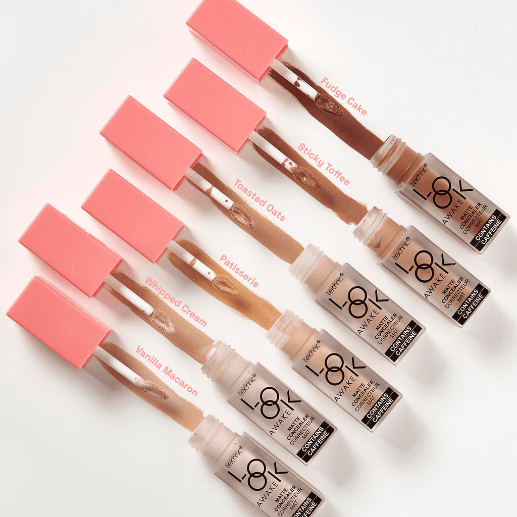 All 6 shades opened in a row from lightest to darkest with the swatches behind each one.