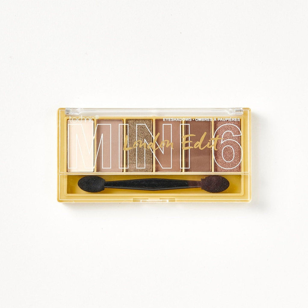 A mini 6 London Edit palette on a white background. It contains brown mattes and shimmer shades.