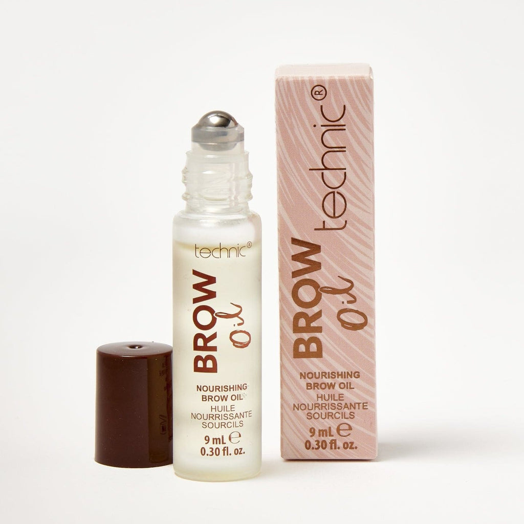An opened brow oil next to its original box packaging on a white background.