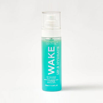 The wake up and hydrate setting spray in front of a white background.